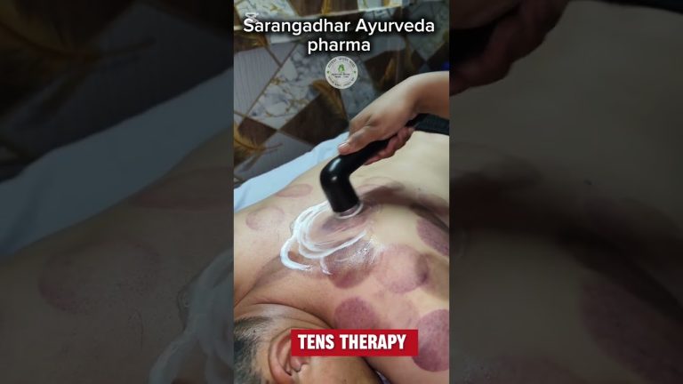 stiffness of shoulder भएको बिरामीलाई टेन्स थेरापी गराउँदै